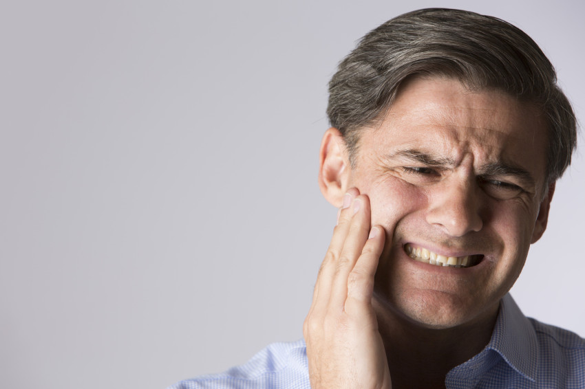 Pain when eating sweets - cavities or sensitive tooth necks