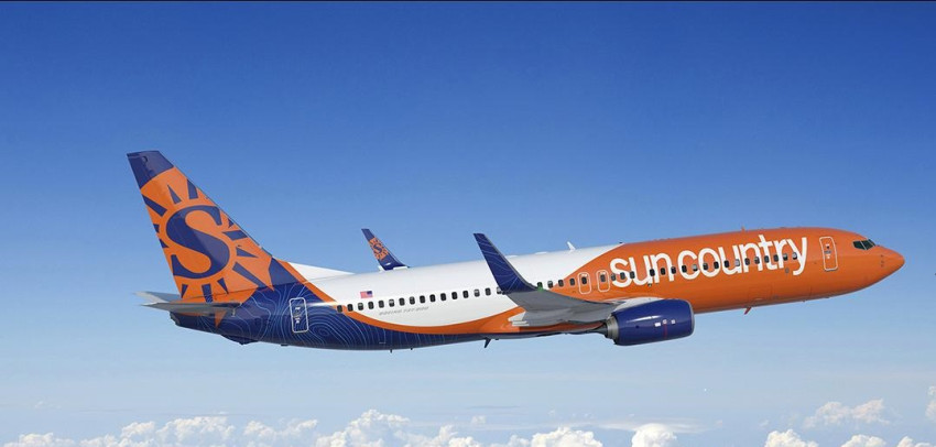 What are the charges for bags and luggage on Sun Country flights?