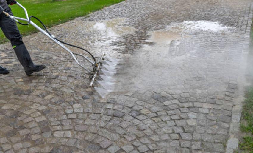 How Driveway Cleaners Handle Paint Spills and Tough Marks?